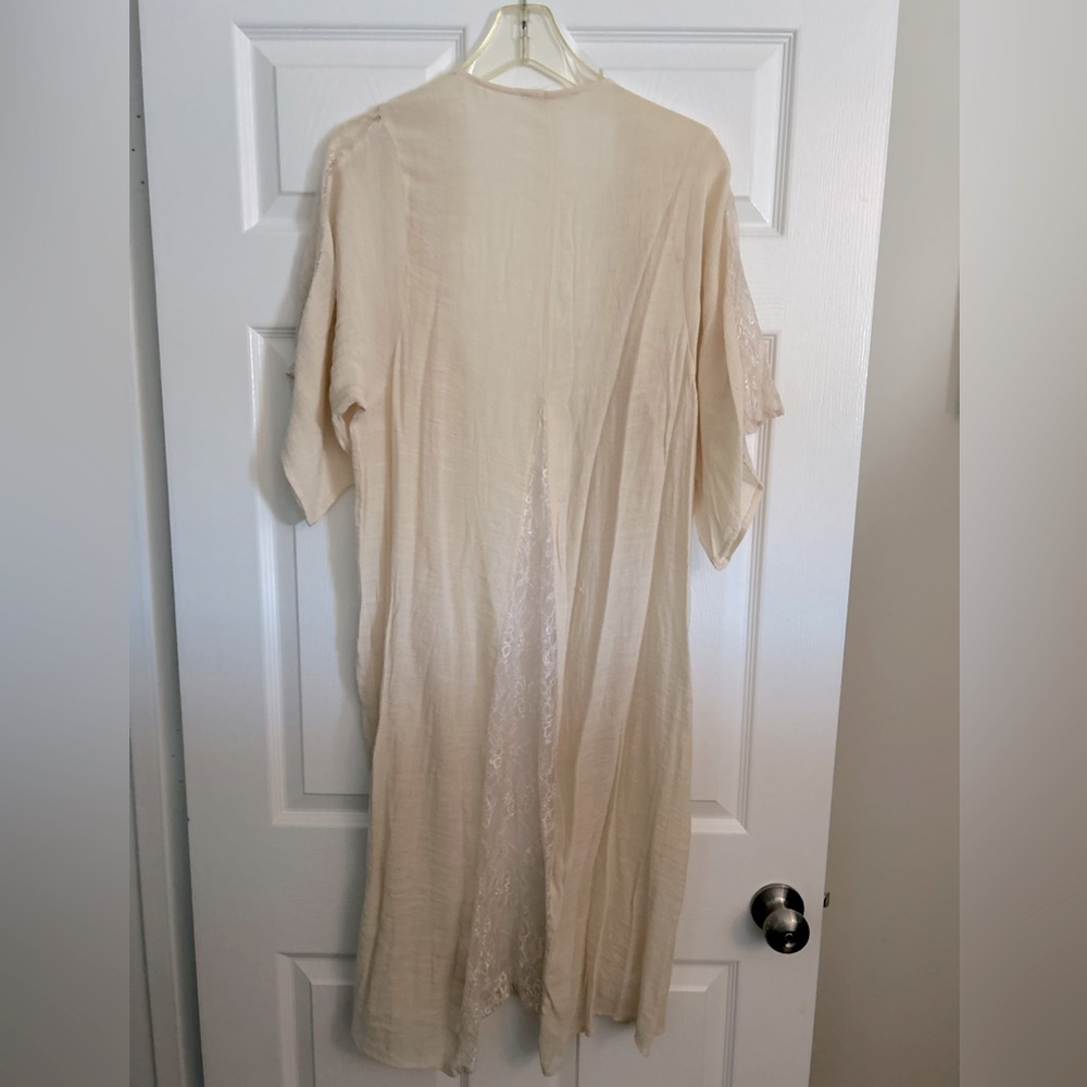 Cream coverup with lace